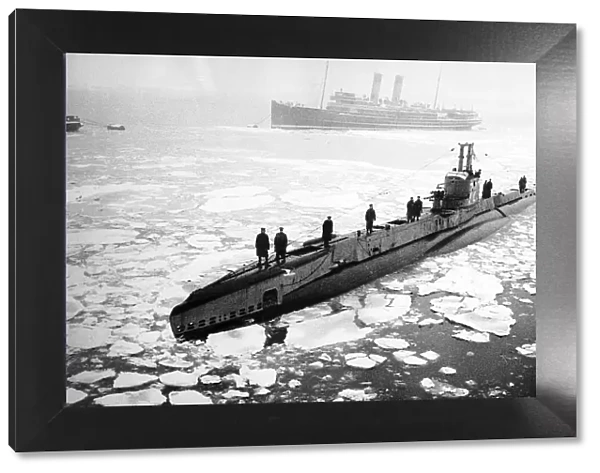 A British submarine noses its way through ice covered waters off the East Coast of