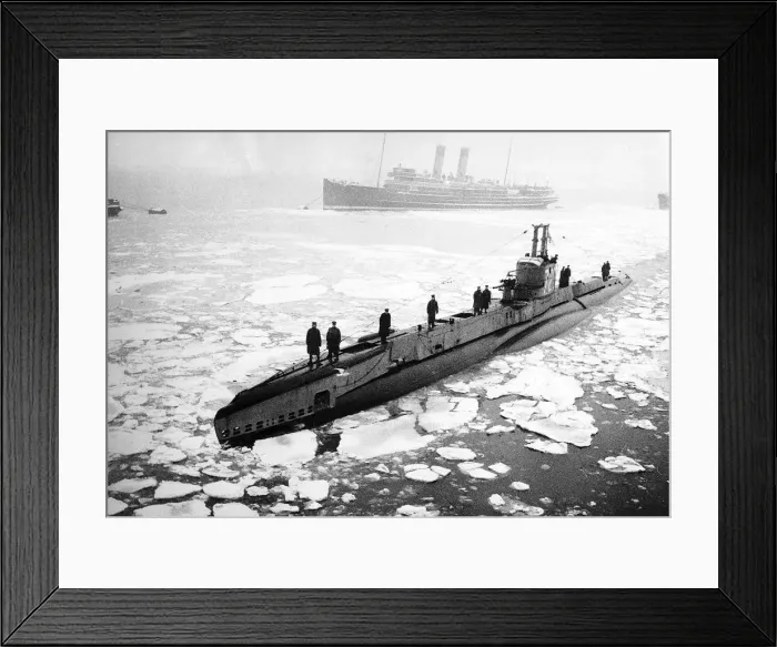 Framed Print : A British submarine noses its way through ice covered waters off the East Coast of