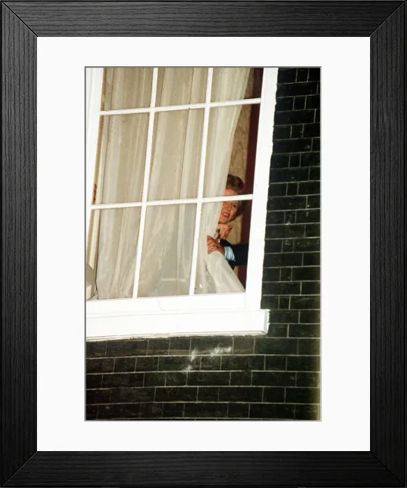 Framed Print : Margaret Thatcher watches through the window at No 10 Downing Street 1990 Framed Print : Margaret Thatcher watches through the window at No 10 Downing Street 1990