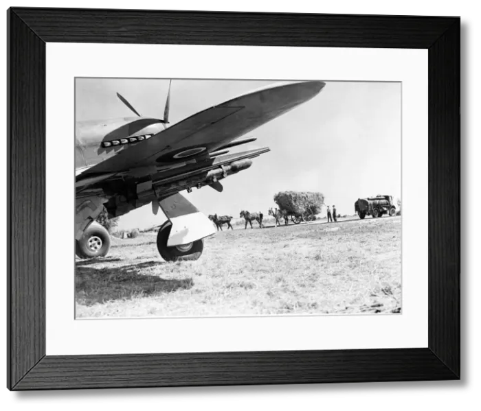 Framed Print : Hawker Typhoon armed with rockets and ready for takeoff from an English field during Framed Print : Hawker Typhoon armed with rockets and ready for takeoff from an English field during