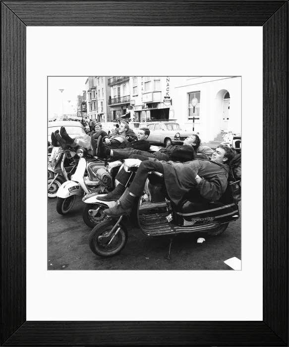 Framed Print : Mods lie back on Vespa Piaggio Scooters on Margate sea front Framed Print : Mods lie back on Vespa Piaggio Scooters on Margate sea front