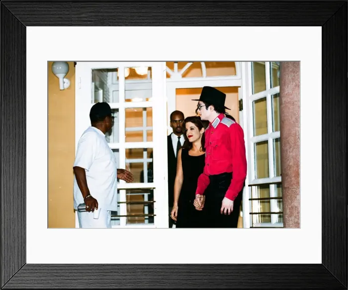 Framed Print : American pop singer Michael jackson with his new bride Lisa-Marie Presley during a visit