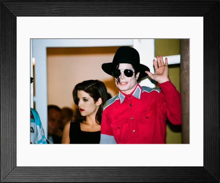 Framed Print : American pop singer Michael jackson with his new bride Lisa-Marie Presley during a visit