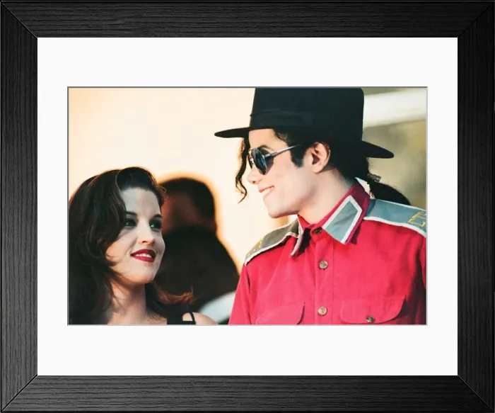 Framed Print : American pop singer Michael jackson with his new bride Lisa-Marie Presley during a visit