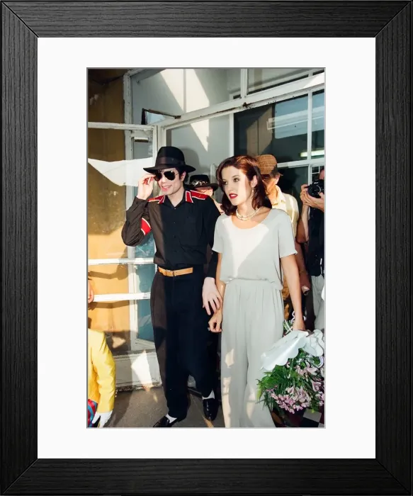 Framed Print : American pop singer Michael jackson with his new bride Lisa-Marie Presley during a visit