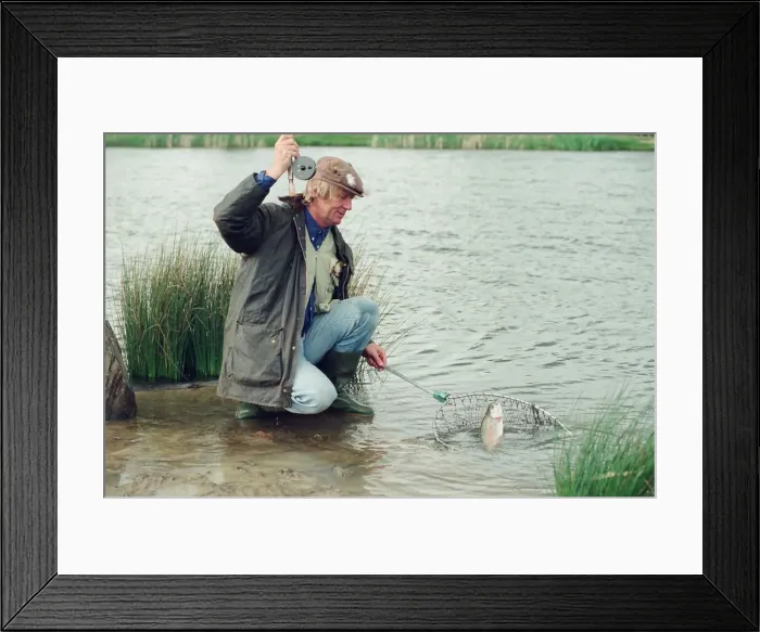Framed Print : Radio Disc Jockey Chris Tarrant enjoying a spot of fishing in his spare time Framed Print : Radio Disc Jockey Chris Tarrant enjoying a spot of fishing in his spare time