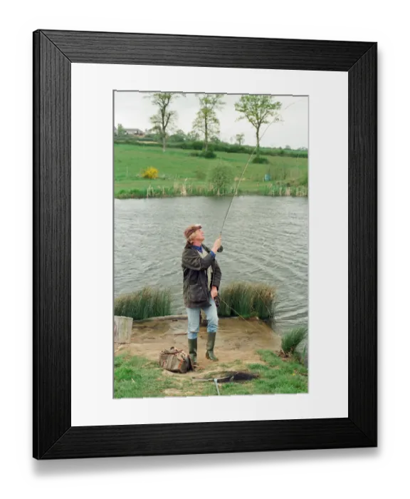 Framed Print : Radio Disc Jockey Chris Tarrant enjoying a spot of fishing in his spare time Framed Print : Radio Disc Jockey Chris Tarrant enjoying a spot of fishing in his spare time