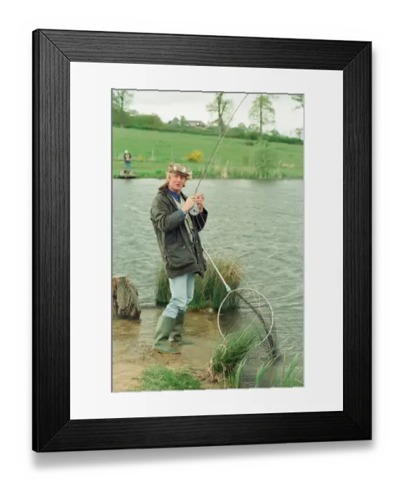 Framed Print : Radio Disc Jockey Chris Tarrant enjoying a spot of fishing in his spare time Framed Print : Radio Disc Jockey Chris Tarrant enjoying a spot of fishing in his spare time
