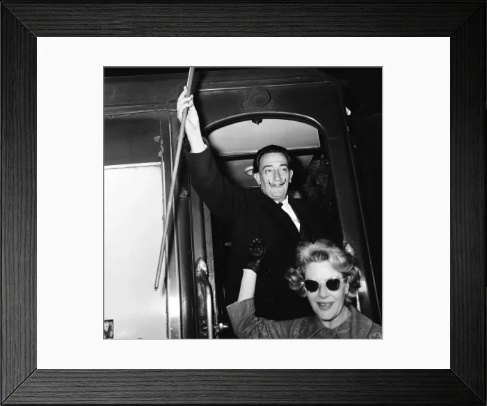 Framed Print : Artist Salvador Dali arrives in the UK, on the continental boat train to promote his