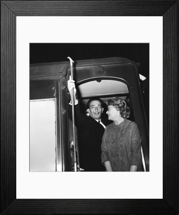 Framed Print : Artist Salvador Dali arrives in the UK, on the continental boat train to promote his