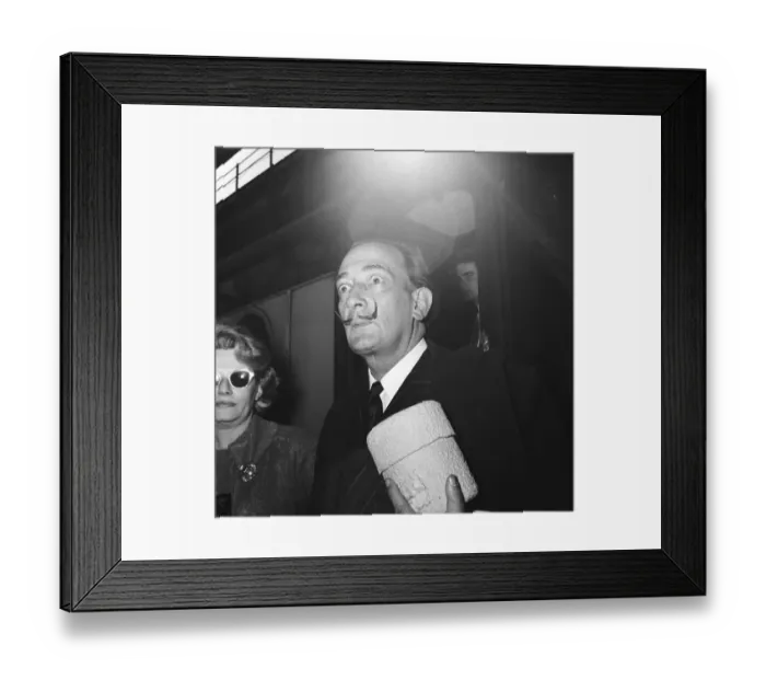 Framed Print : Artist Salvador Dali arrives in the UK, on the continental boat train to promote his Framed Print : Artist Salvador Dali arrives in the UK, on the continental boat train to promote his