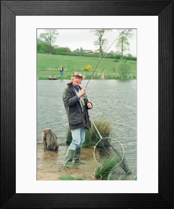 Framed Print : Radio Disc Jockey Chris Tarrant enjoying a spot of fishing in his spare time Framed Print : Radio Disc Jockey Chris Tarrant enjoying a spot of fishing in his spare time