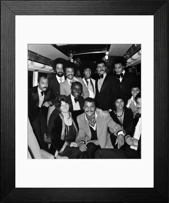 Framed Print : John Conteh celebrates with family aboard a playboy motor coach after winning world title Framed Print : John Conteh celebrates with family aboard a playboy motor coach after winning world title
