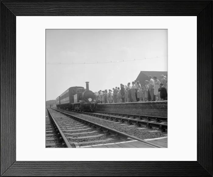 Framed Print : Crowds on the platform at Horsted Keynes station await the arrival of the London