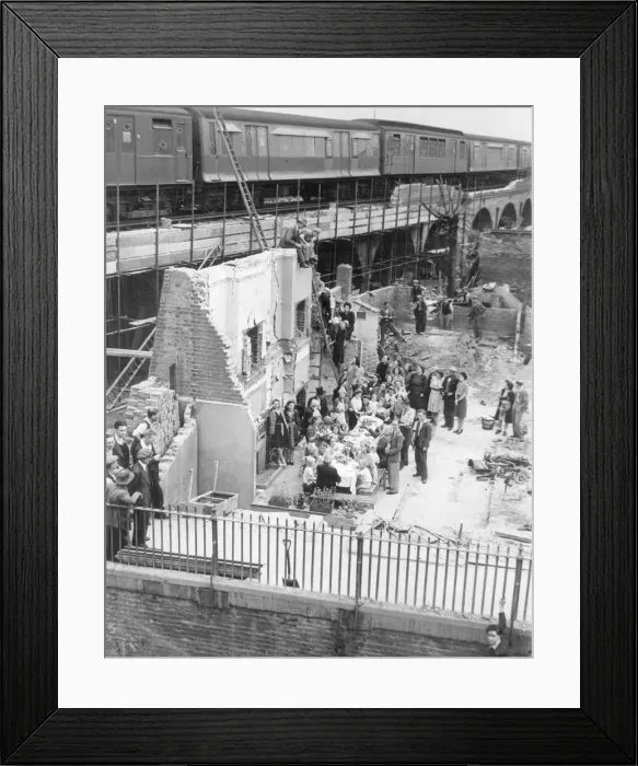 Framed Print : Christine Pierce birthday party held in the ruins of her familys house in Hammersmith Framed Print : Christine Pierce birthday party held in the ruins of her familys house in Hammersmith