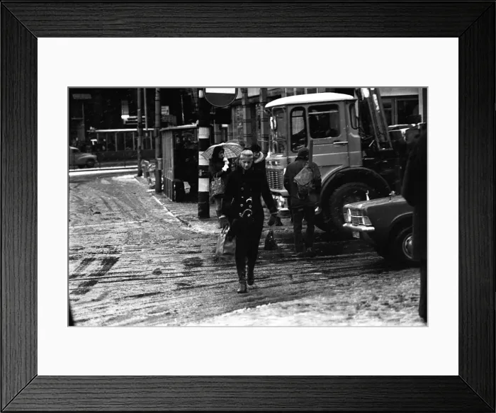 Framed Print : Traffic and pedestrains struggle against the snow on Grainger Street Framed Print : Traffic and pedestrains struggle against the snow on Grainger Street