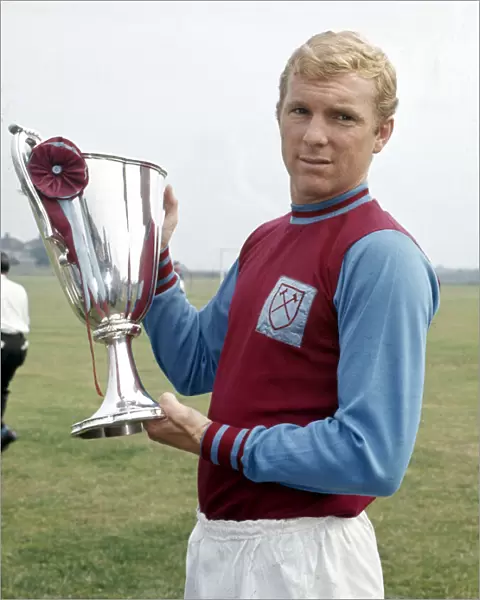 West Ham United captain Bobby Moore holds the European Cup Winners Cup trophy