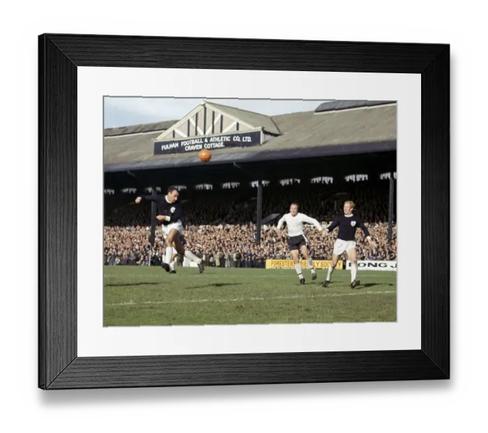 Framed Print : Tottenham Hotspurs Alan Gilzean heads at goal during the English League Division One Framed Print : Tottenham Hotspurs Alan Gilzean heads at goal during the English League Division One