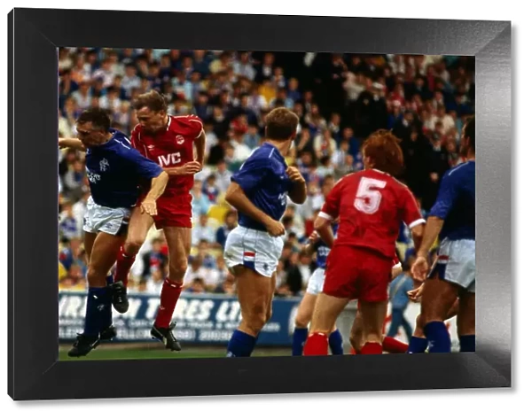 Aberdeen versus Rangers Premier Davie Dodds heads ball past Graham Roberts August 1987