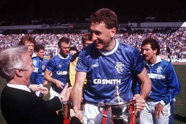 Terry Butcher shakes hands with David Holmes April 1987 In background David Holmes