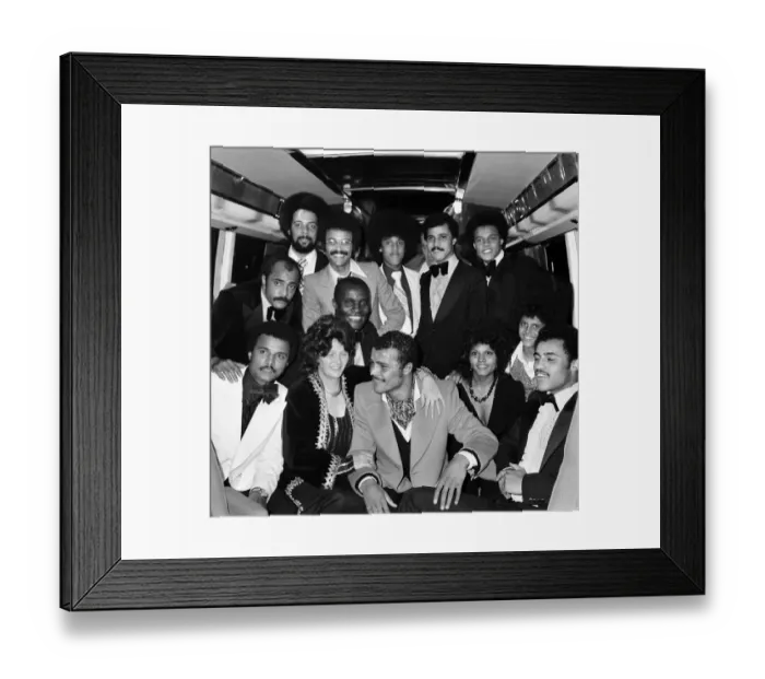 Framed Print : John Conteh celebrates with family aboard a playboy motor coach after winning world title