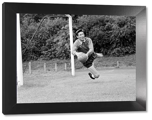 Goalkeeper for Tottenham Hotspur practicing his saves during training