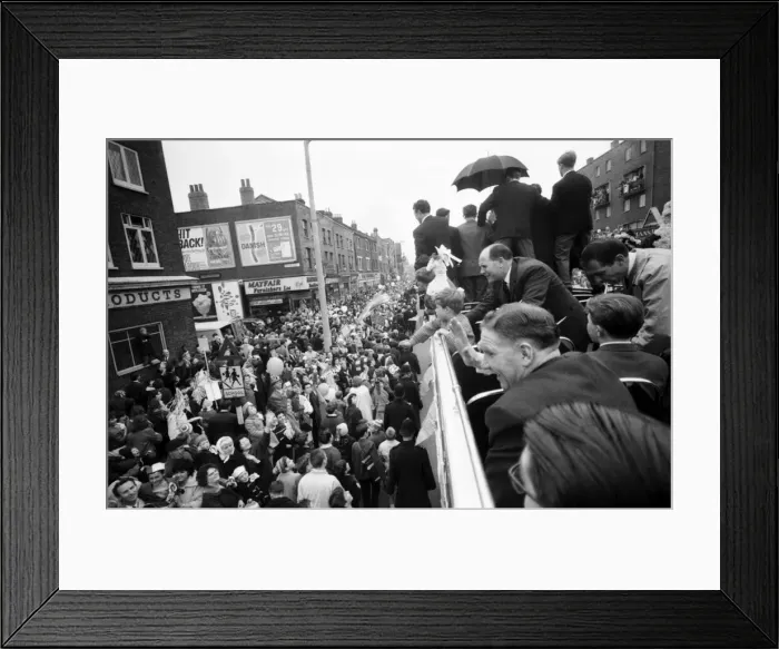 Framed Print : Tottenham Hotspur team hold the FA Cup trophy aloft from an open top double decker bus to Framed Print : Tottenham Hotspur team hold the FA Cup trophy aloft from an open top double decker bus to
