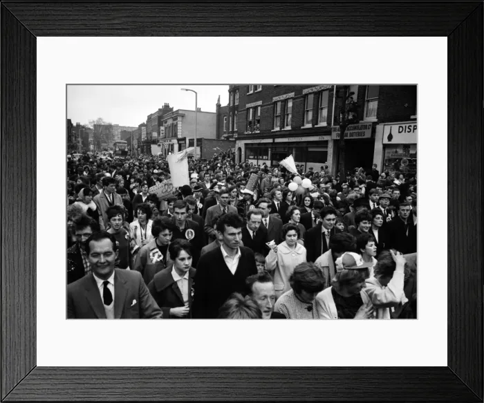 Framed Print : Fans of Tottenham Hotspur celebrate in the streets of North London after winning the FA