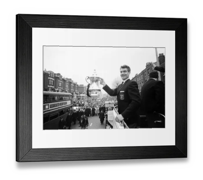 Framed Print : Tottenham Hotspur team hold the FA Cup trophy aloft from an open top double decker bus to Framed Print : Tottenham Hotspur team hold the FA Cup trophy aloft from an open top double decker bus to