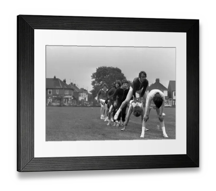 Framed Print : Class 2a take part in a sponsored Leapfrog marathon at Bablake School, Coventry