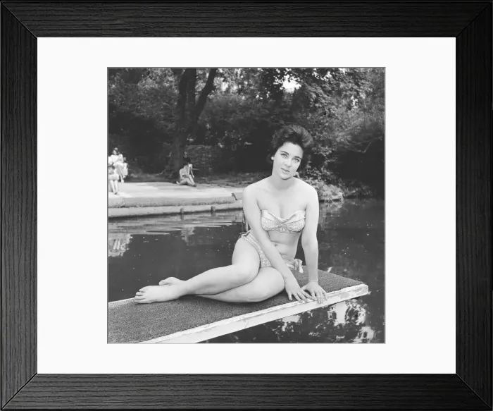 Framed Print : Model Barara Joyce seen here at the local lido modelling the latest beach wear Framed Print : Model Barara Joyce seen here at the local lido modelling the latest beach wear