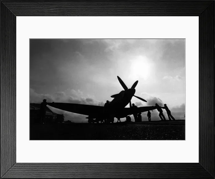 Framed Print : Aviation - Spitfire - The Spitfire at the entrance gates to RAF Brawdy being taken away Framed Print : Aviation - Spitfire - The Spitfire at the entrance gates to RAF Brawdy being taken away