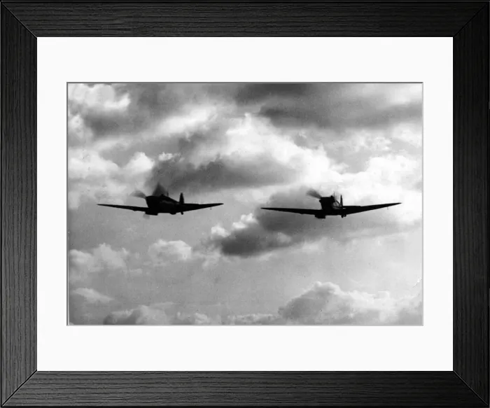 Framed Print : Aviation - Spitfire - Two Spitfires appear out of the clouds - somewhere in England Framed Print : Aviation - Spitfire - Two Spitfires appear out of the clouds - somewhere in England