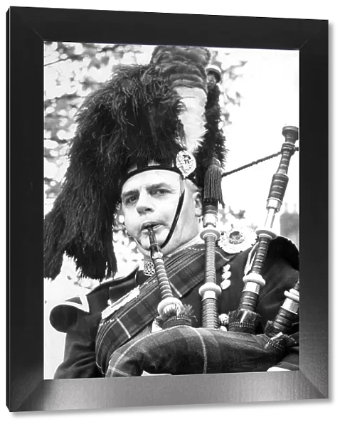 Pipe Major George Anderson, of Morpeth Pipe Band, gets himself tune up in June 1972