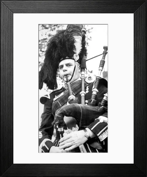Framed Print : Pipe Major George Anderson, of Morpeth Pipe Band, gets himself tune up in June 1972 Framed Print : Pipe Major George Anderson, of Morpeth Pipe Band, gets himself tune up in June 1972