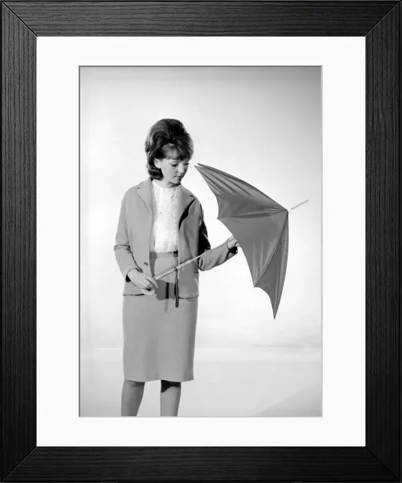 Framed Print : Reveille Fashion Feature Reveille Model M Walden seen here with an umbrella Framed Print : Reveille Fashion Feature Reveille Model M Walden seen here with an umbrella