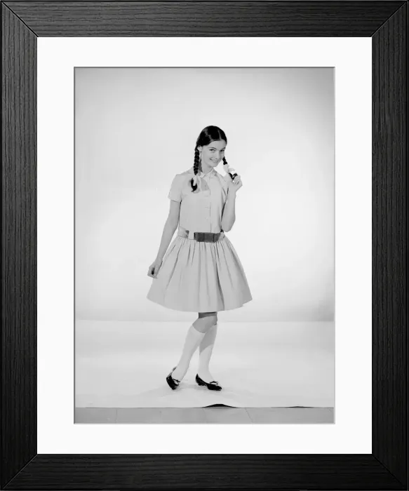 Framed Print : Model Jennifer Goddard. Brown-haired girl in checkered dress with pig tails Framed Print : Model Jennifer Goddard. Brown-haired girl in checkered dress with pig tails