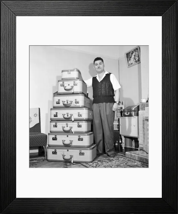 Framed Print : Holidays: Packing the luggage prior to going on holiday. 1960 F46-002