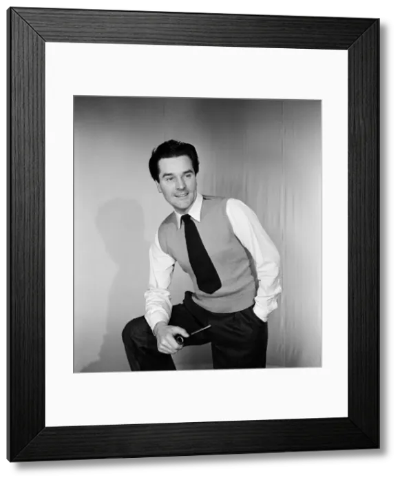 Framed Print : Man smoking pipe. c1964