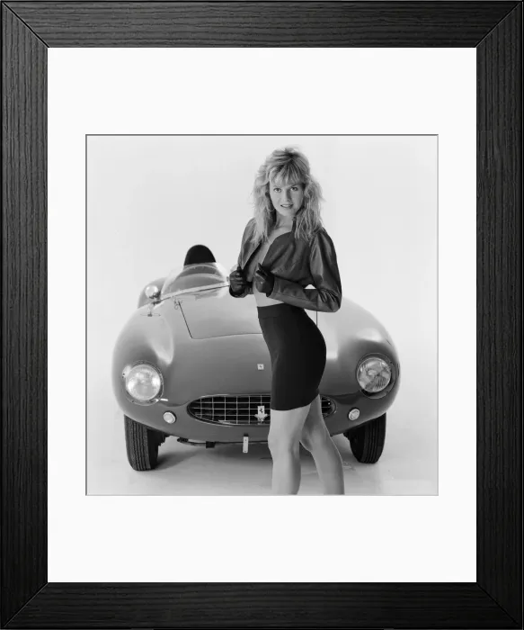 Framed Print : Glamour model Caroline Delahunty poses next to a Ferrari. 19th April 1988