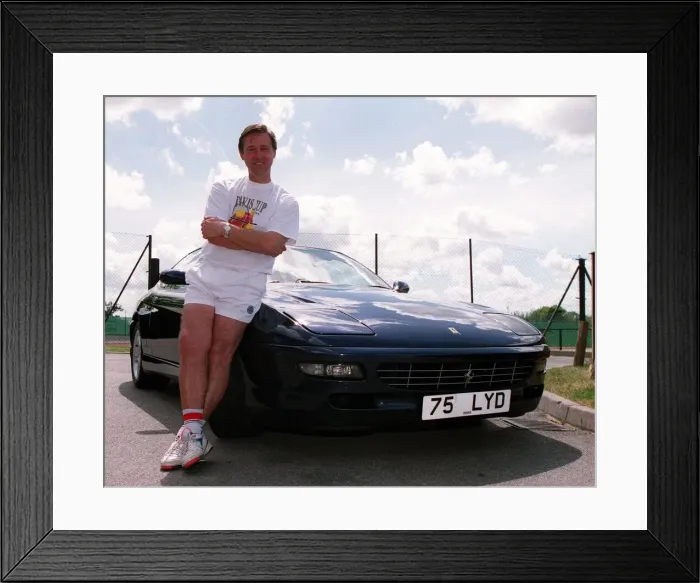 Framed Print : Former tennis player David Lloyd with his Ferrari sports car. 26th May 1995