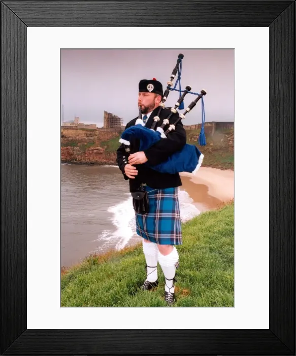 Framed Print : North Tyneside Pipe Band piper, Kevin Fraser sports the new tartan, designed for the band Framed Print : North Tyneside Pipe Band piper, Kevin Fraser sports the new tartan, designed for the band