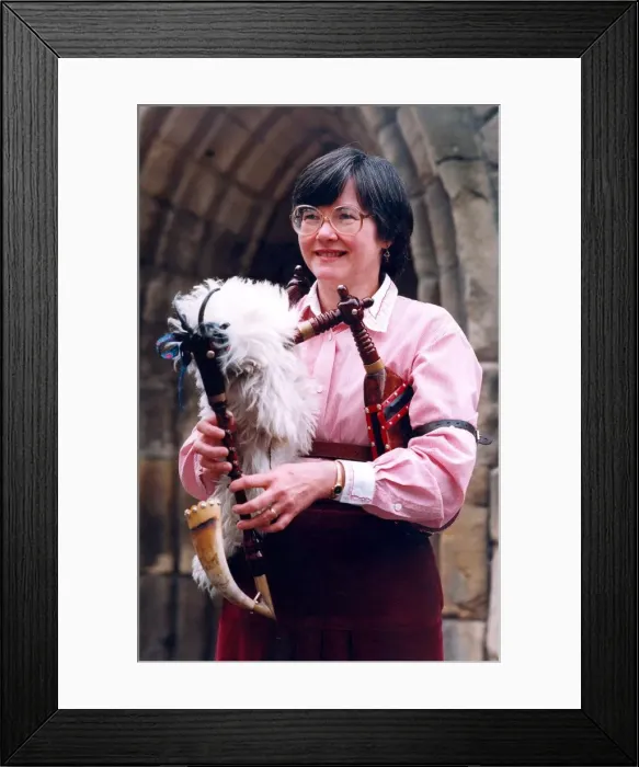 Framed Print : Ann Sessoms assistant curator at The Chantry Museum, Morpeth with bagpipes made Framed Print : Ann Sessoms assistant curator at The Chantry Museum, Morpeth with bagpipes made