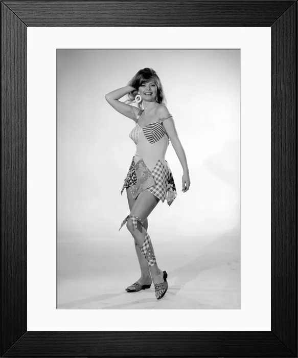 Framed Print : Reveille Beachwear Fashion Feature Woman modelling a patchwork one piece swimming