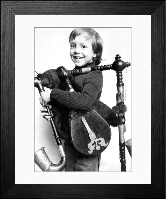 Framed Print : Skippy Sobel summons up some puff power for this rare and valuable instrument Framed Print : Skippy Sobel summons up some puff power for this rare and valuable instrument