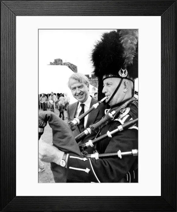 Framed Print : Alnwick Piper Jimmy Jones talks with Mr. Peter Walker after piping him in to open a Framed Print : Alnwick Piper Jimmy Jones talks with Mr. Peter Walker after piping him in to open a