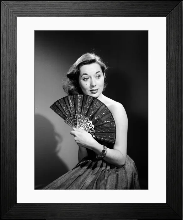 Framed Print : Model with fan in strapless dress. Model with fan in strapless dress. Circa 1964 Framed Print : Model with fan in strapless dress. Model with fan in strapless dress. Circa 1964