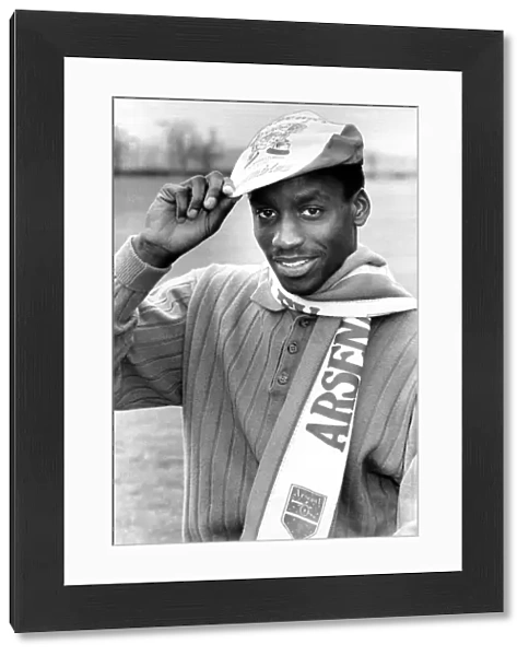 Gus Caesar Football Player of Arsenal - April 1988 wearing a Arsenal Cap and Scarf