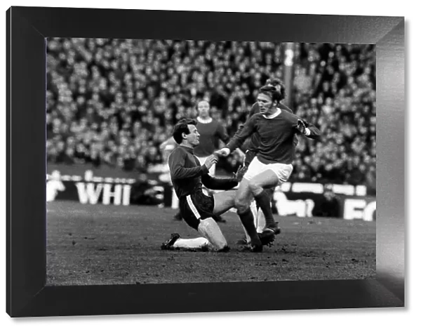 Pat Crerand of Manchester United is tackled January 1971 by Chelseas Peter Houseman