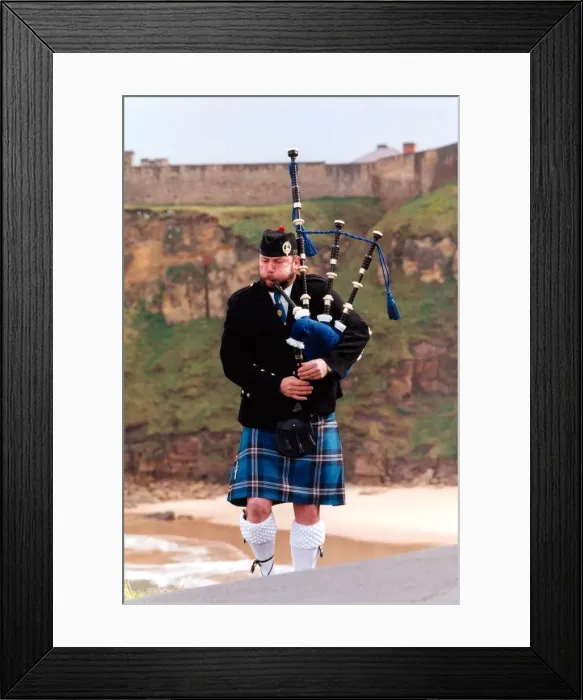 Framed Print : North Tyneside Pipe Band piper, Kevin Fraser sports the new tartan, designed for the band Framed Print : North Tyneside Pipe Band piper, Kevin Fraser sports the new tartan, designed for the band